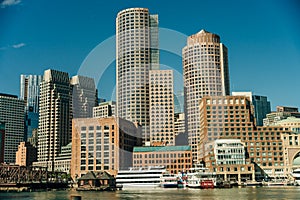 Boston cityscape in sunny day, view from harbor on downtown, Massachusetts, USA