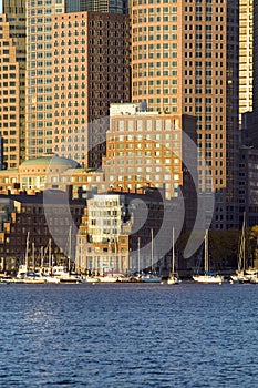 Boston Harbor and the Boston skyline at sunrise as seen from South Boston, Massachusetts, New England