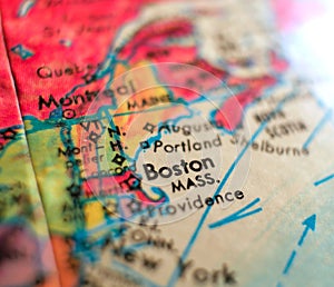 Boston Massachusetts USA focus macro shot on globe map for travel blogs, social media, web banners and backgrounds.