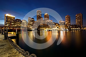 Boston Skyline with Financial District and Boston Harbor at Dusk