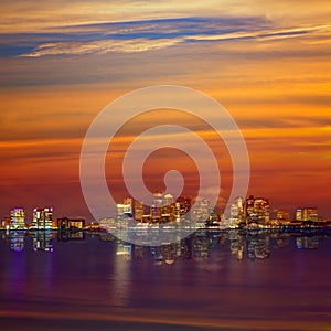 Boston skyline at sunset and river in Massachusetts