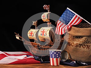 Boston tea party is symbol of English tea rejection . Distribution coffee in America. USA flag photo