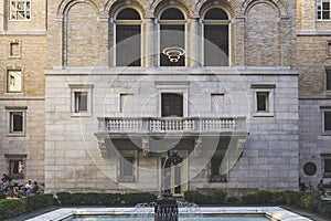 Boston, USA - October 22, 2021: Vintage look of a sculpture on the courtyard of the Mckim building of Boston Public Library