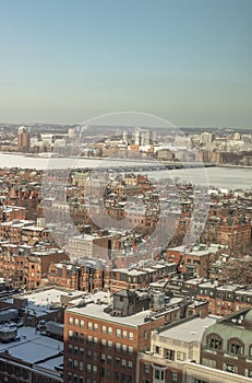 Bostons back bay neighborhood in the winter with the Charles river frozen