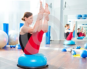 Bosu ball for fitness instructor woman in aerobics