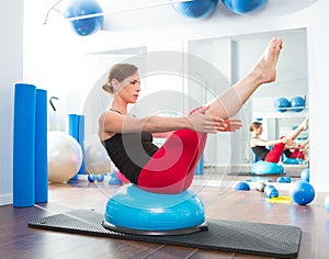 Bosu ball for fitness instructor woman in aerobics