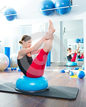 Bosu ball for fitness instructor woman in aerobics