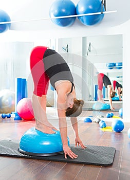 Bosu ball for fitness instructor woman in aerobics