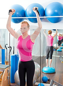 Bosu ball for fitness woman in aerobics gym