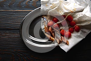 Bota sardine with osmotized tomatoes photo