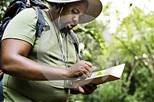 Botanist making notes in his notepad photo