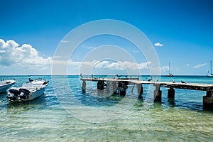 Botes anchored on the beach at Los Roques National Park