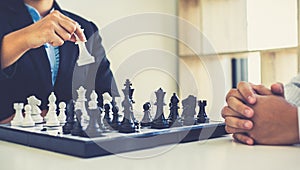 Both businessmen played chess to increase their business skills and held hands together for success