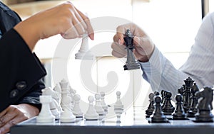 Both businessmen played chess to increase their business skills and held hands together for success
