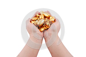 Both hands holding gold coins