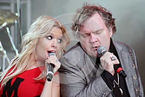 The Late Meat Loaf duets with his blonde backing singer on tour in the UK in 2013