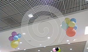 Both Perforated Grid ceiling and White Painted gypsum ceiling joints for an Retail shop during festival sale