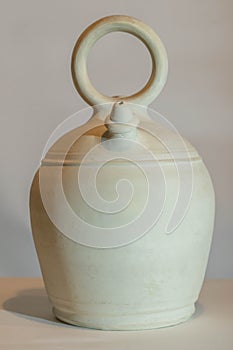 Botijo traditional clay pot jug photo