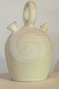 Botijo traditional clay pot jug photo