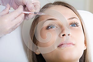 Botox or hyaluronic acid injection