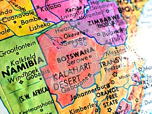 Botswana Africa focus macro shot on globe map for travel blogs, social media, website banners and backgrounds.