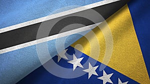 Botswana and Bosnia and Herzegovina two flags textile cloth, fabric texture