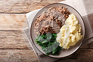 Botswana cuisine: seswaa beef stew with pap porridge and spinach