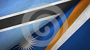 Botswana and Marshall Islands two flags textile cloth, fabric texture