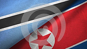 Botswana and North Korea two flags textile cloth, fabric texture