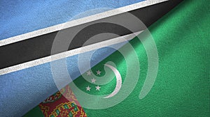 Botswana and Turkmenistan two flags textile cloth, fabric texture