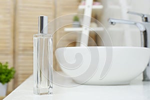 Bottle of air freshener on counter photo