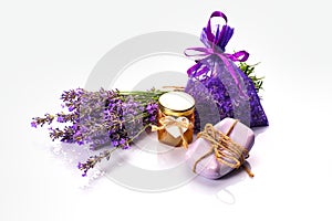 Bottle with aroma oil and lavender flowers