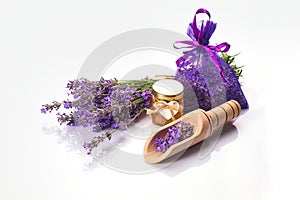 Bottle with aroma oil and lavender flowers isolated