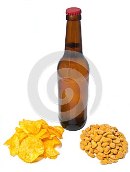 The bottle beer with chips and peanuts