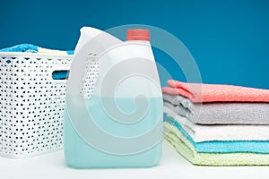 Bottle of bleach with clean terry towels