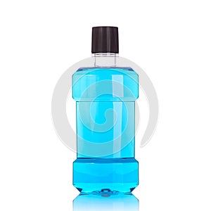 Bottle of blue mouthwashes. Studio shot isolated on white