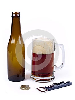 Bottle of bock beer next to a glass photo