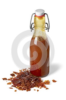 Bottle of brown Shellac liquid on white background photo