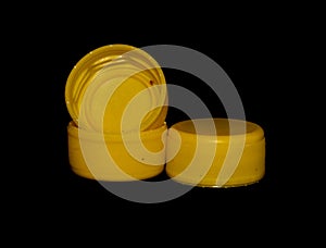 bottle cap isolated on black background