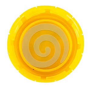 bottle cap plastic yellow isolated on white background