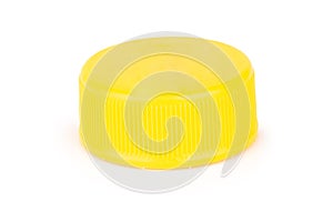 bottle cap plastic yellow isolated on white background