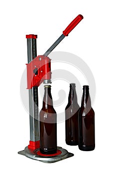 Bottle Cap Press and Bottles for Homebrew Beer photo