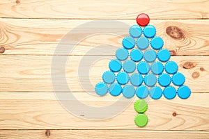 Bottle caps in shape of christmas tree