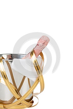 A bottle of champagne in an ice bucket