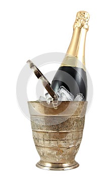 Bottle of champagne in old silver ice bucket