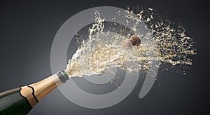 Bottle of champagne splashing upwards