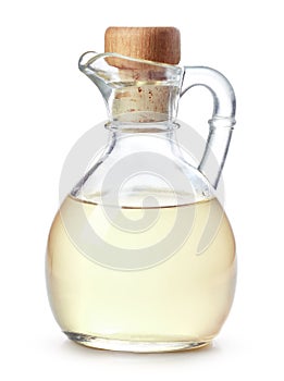 Bottle of coconut oil on white background