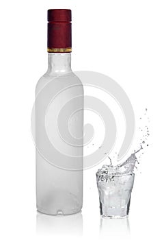 Bottle of cold vodka and glass with vodka