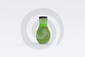 Bottle covered with grass