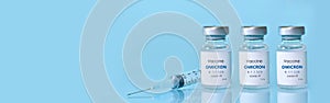 Bottle of Covid-19 vaccine to immunize from the Omicron Variant Coronavirus. The concept of medicine, healthcare and science.Copy